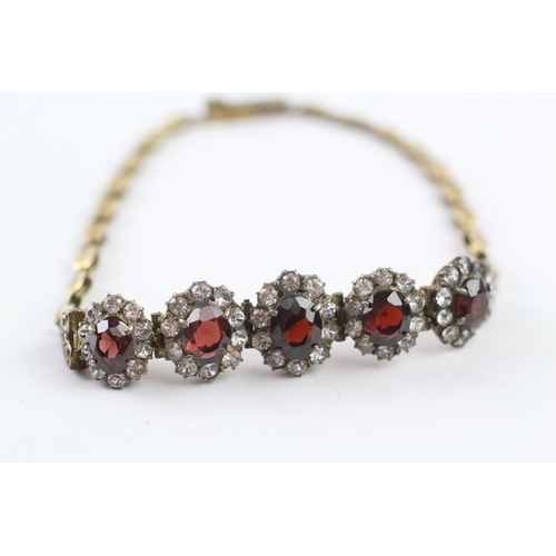 323 - 6ct gold vintage garnet and white sapphire graduated halo bracelet (10.5g)