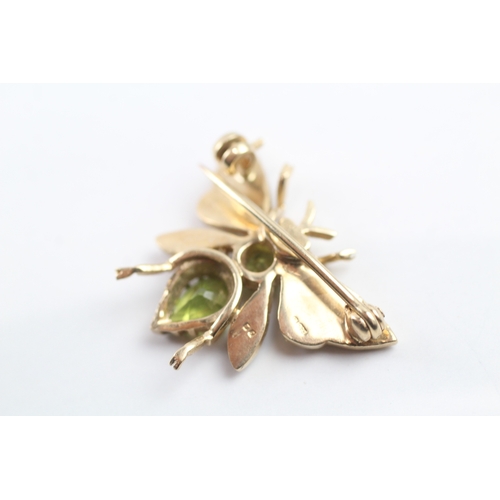 325 - 9ct gold peridot, ruby and seed pearl bug brooch (3.8g)