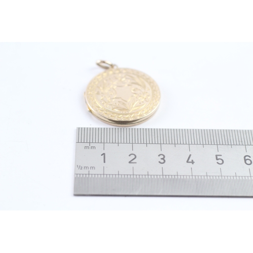 333 - 9ct gold back and front round locket (4.8g)