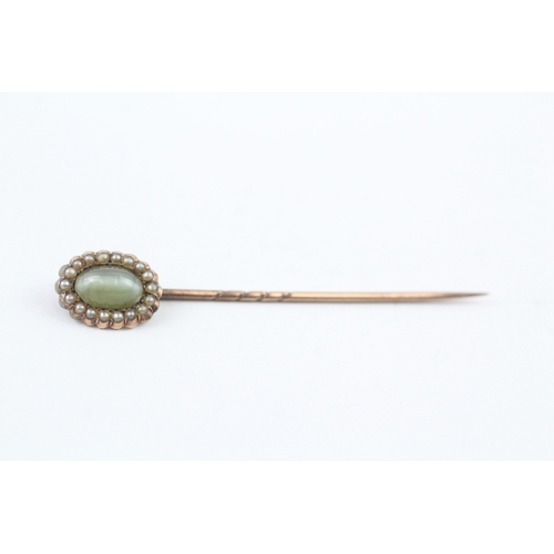 336 - A Victorian gold mourning brooch and stick pin, stone set (5.3g)