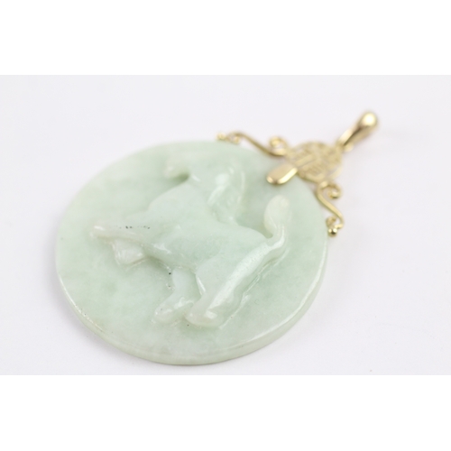 338 - 14ct gold bail carved jade pendant (19.5g)