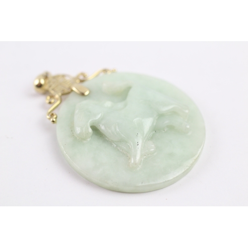 338 - 14ct gold bail carved jade pendant (19.5g)