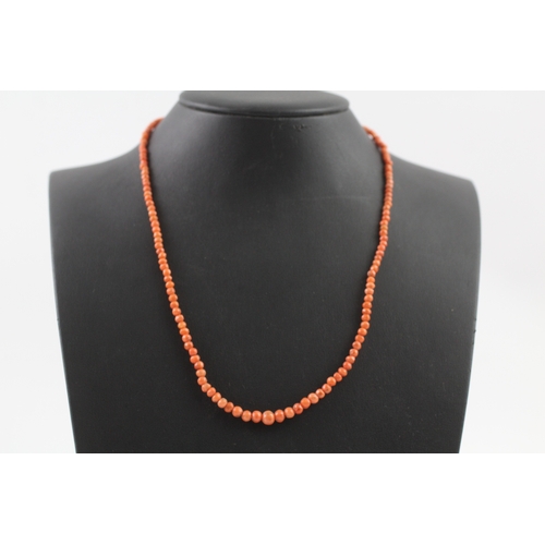 345 - 9ct gold clasped antique coral bead necklace (7.9g)