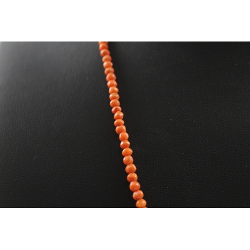 345 - 9ct gold clasped antique coral bead necklace (7.9g)