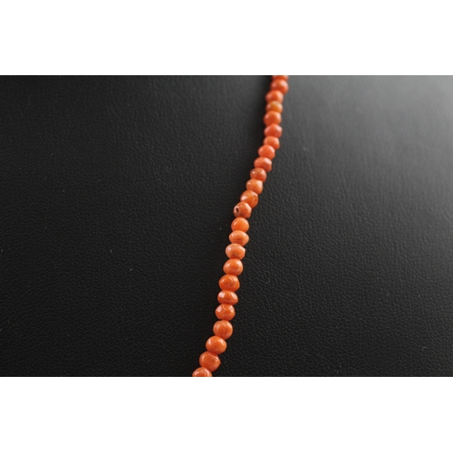 345 - 9ct gold clasped antique coral bead necklace (7.9g)