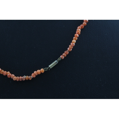 345 - 9ct gold clasped antique coral bead necklace (7.9g)