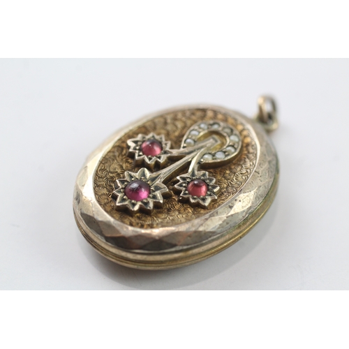 355 - 9ct gold back and front Victorian locket set with garnet and seed pearl (10.7g)