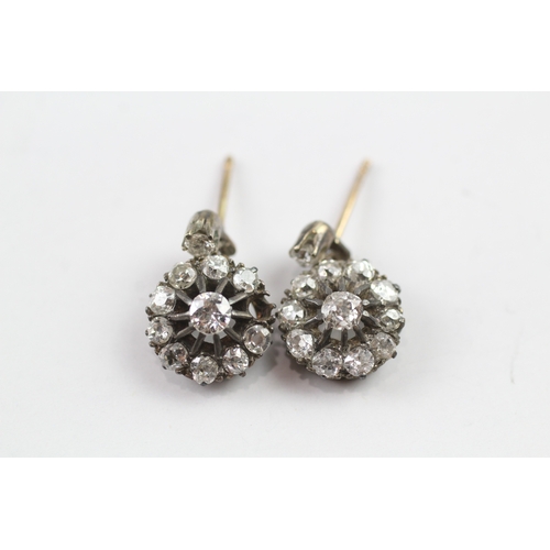 368 - Low carat and silver diamond halo drop earrings (2.6g)