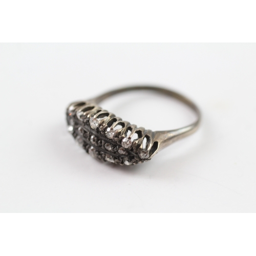 371 - A gold and diamond ring (4.6g) Size T