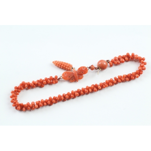 372 - 9ct gold antique coral necklace with carved butterfly (11.5g)