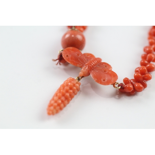 372 - 9ct gold antique coral necklace with carved butterfly (11.5g)