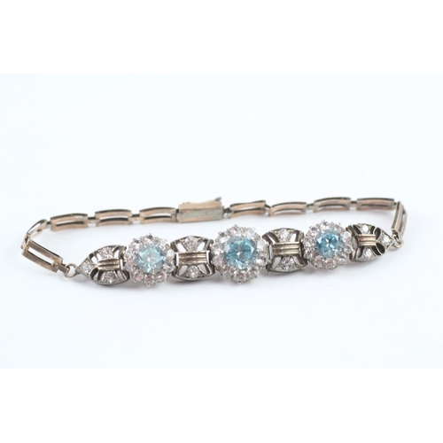 38 - 9ct gold vintage white sapphire and blue zircon bracelet (9.7g)