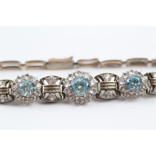 38 - 9ct gold vintage white sapphire and blue zircon bracelet (9.7g)