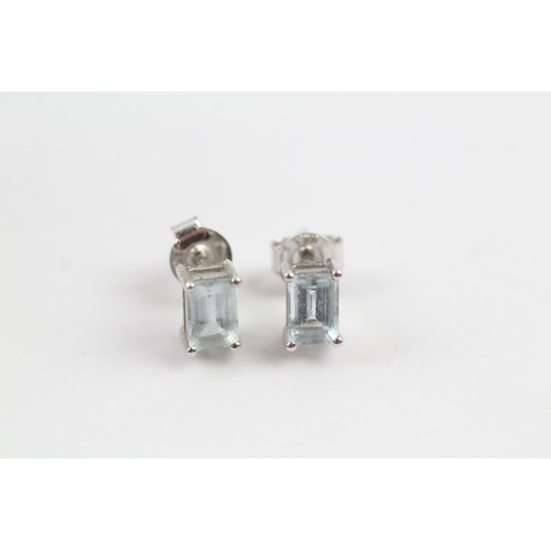 382 - 9ct white gold topaz matching pendant and stud earrings (2.2g)