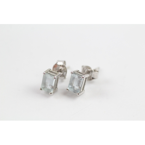 382 - 9ct white gold topaz matching pendant and stud earrings (2.2g)