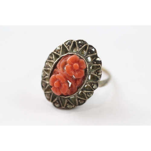 384 - 9ct gold and silver marcasite and coral ring (3.3g) Size I