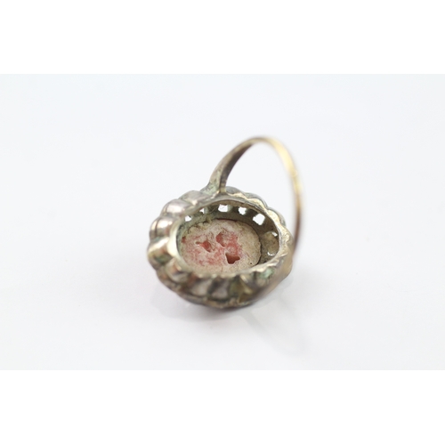 384 - 9ct gold and silver marcasite and coral ring (3.3g) Size I