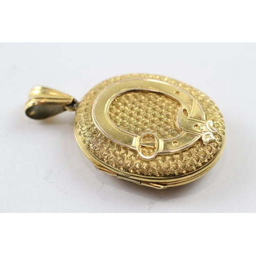 386 - 9ct gold Victorian buckle detail locket (12.1g)