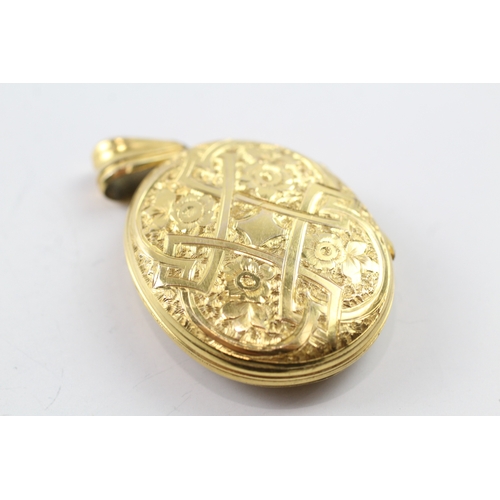 386 - 9ct gold Victorian buckle detail locket (12.1g)