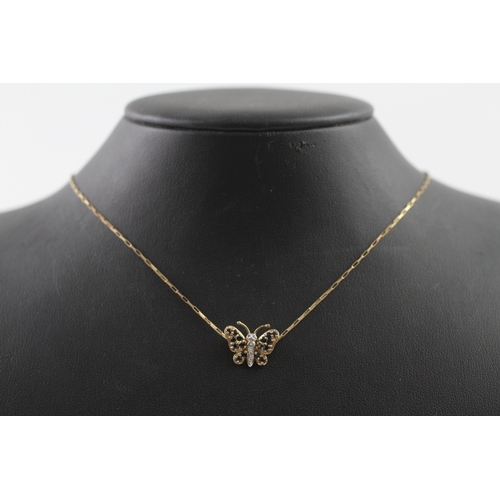 387 - 9ct gold diamond and sapphire butterfly pendant (1.8g)