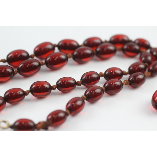 388 - 9ct gold clasped bakelite bead necklace, as found (12.7g)