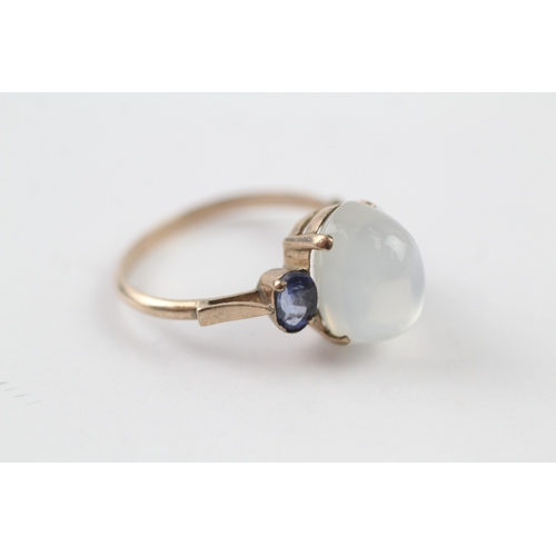 39 - 9ct gold moonstone and sapphire ring (3.3g) Size P 1/2