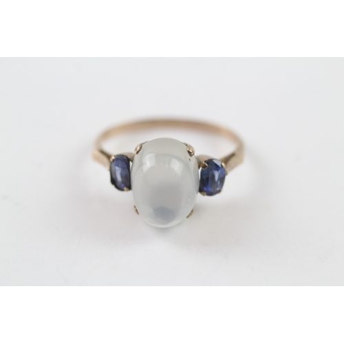 39 - 9ct gold moonstone and sapphire ring (3.3g) Size P 1/2