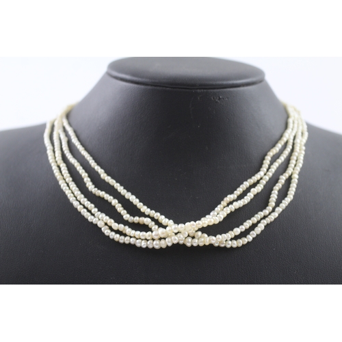 401 - 9ct gold and silver mourning clasp pearl necklace (16.9g)