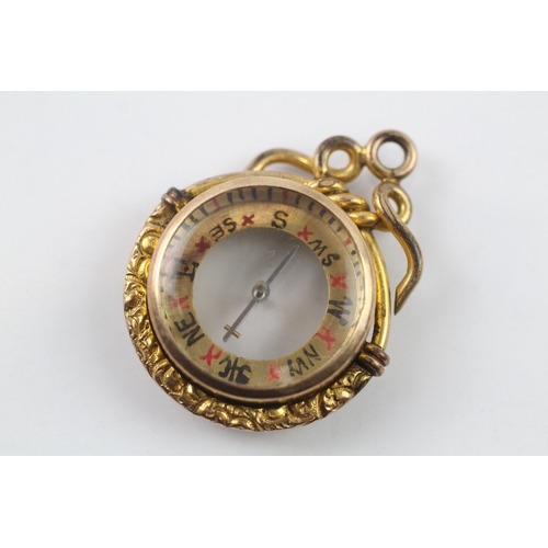 41 - 9ct gold antique compass fob with gold plated mount (8.5g)