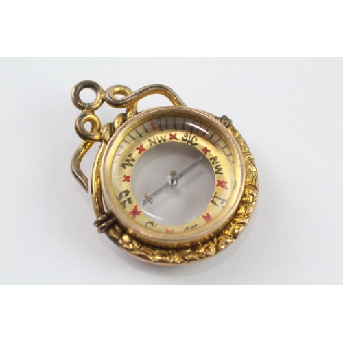 41 - 9ct gold antique compass fob with gold plated mount (8.5g)