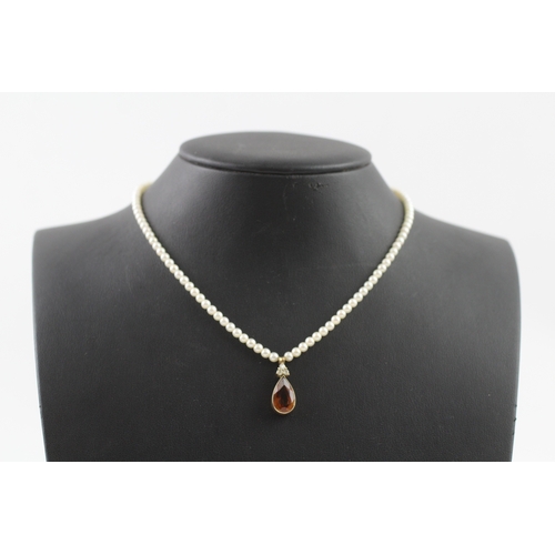 412 - 14ct gold pearl necklace with a diamond and citrine pendant (7.3g)