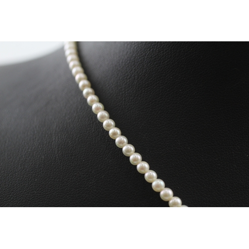 412 - 14ct gold pearl necklace with a diamond and citrine pendant (7.3g)