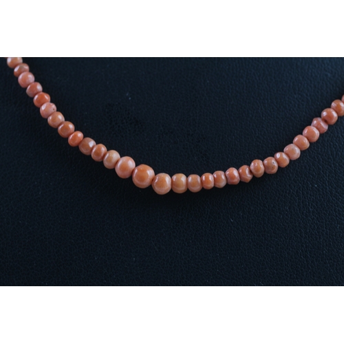 417 - 9ct gold clasped antique coral bead necklace (5.5g)