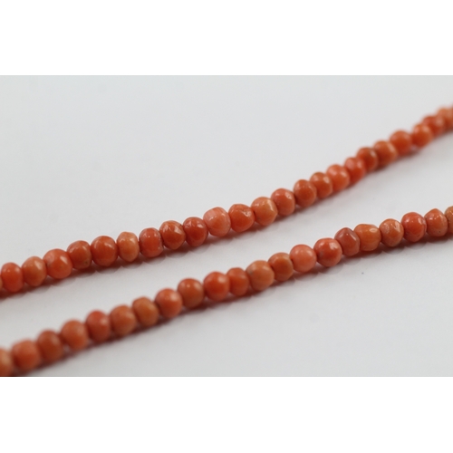 417 - 9ct gold clasped antique coral bead necklace (5.5g)