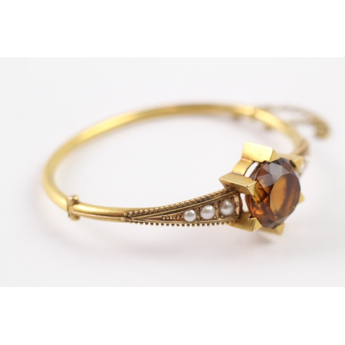 419 - 15ct gold Victorian smoky quartz and pearl bangle (13.3g)