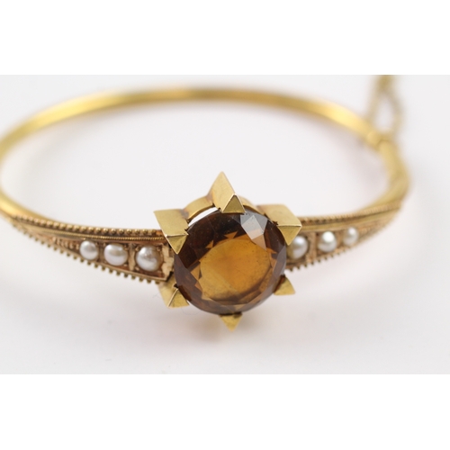 419 - 15ct gold Victorian smoky quartz and pearl bangle (13.3g)