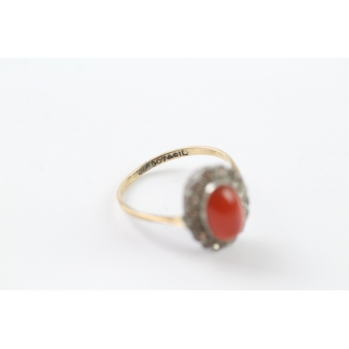 42 - 9ct gold and silver paste and carnelian ring (2.1g) Size P