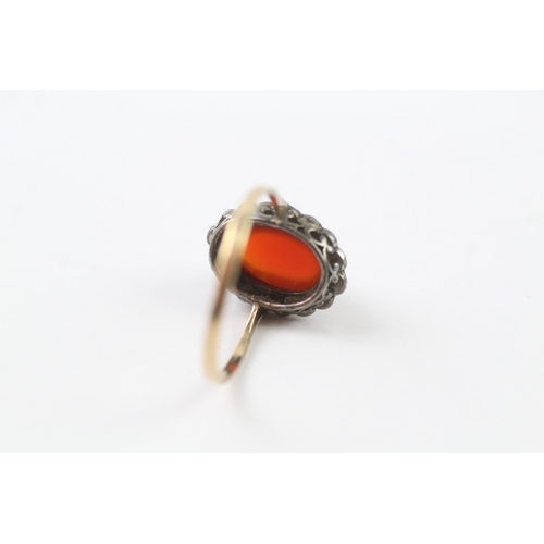 42 - 9ct gold and silver paste and carnelian ring (2.1g) Size P