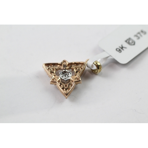 428 - 9ct gold diamond set pendant (1.6g)