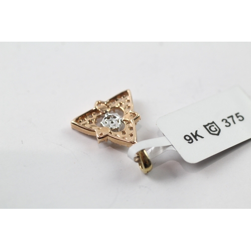 428 - 9ct gold diamond set pendant (1.6g)