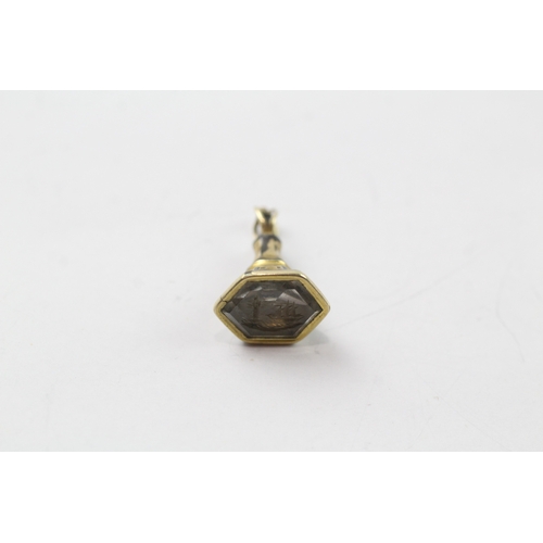 429 - 9ct gold cased carved seal fob (1.2g)