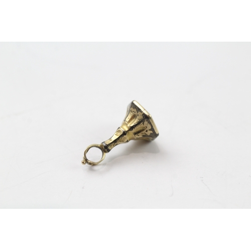 429 - 9ct gold cased carved seal fob (1.2g)