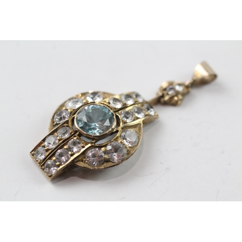 439 - 9ct gold white sapphire and blue zircon pendant (4.4g)