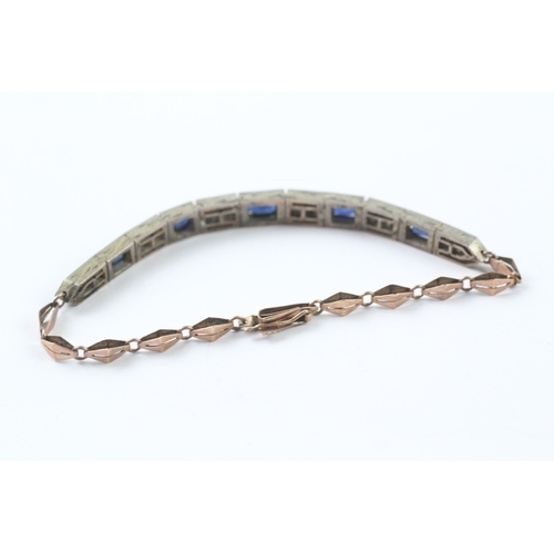 447 - Yellow and white metal bracelet set with blue and white sapphires (10.6g)