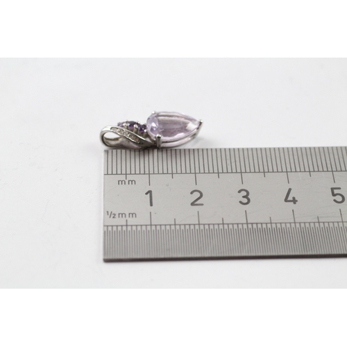 458 - 9ct gold amethyst and diamond set pendant (1.9g)