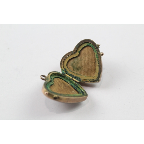 463 - 9ct gold heart design photo locket (6.6g)