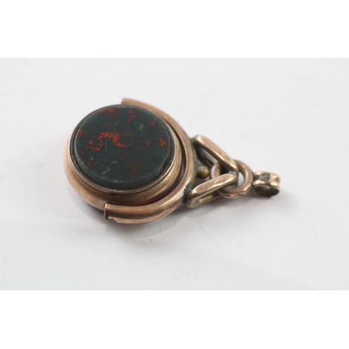 479 - 9ct gold bloodstone and carnelian spinning fob (4.5g)