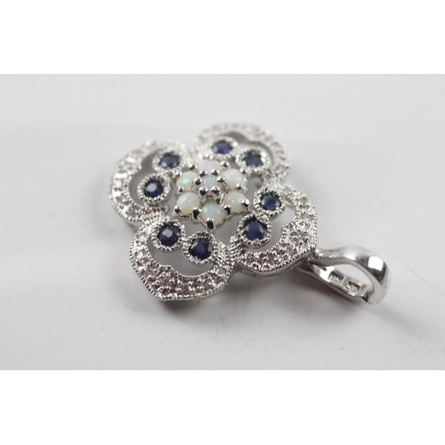 490 - 9ct white gold diamond, sapphire and opal pendant (4.3g)