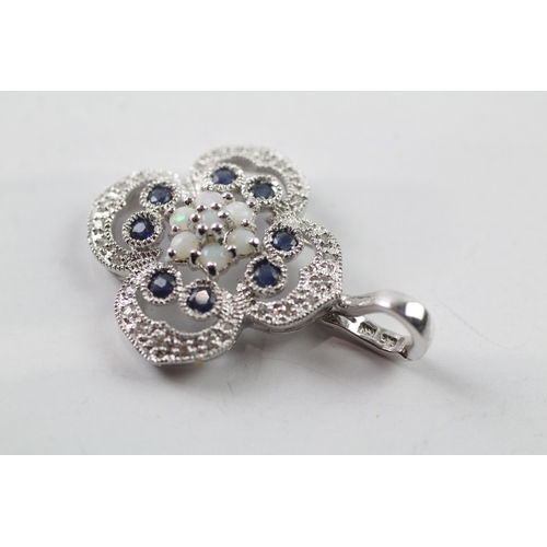 490 - 9ct white gold diamond, sapphire and opal pendant (4.3g)