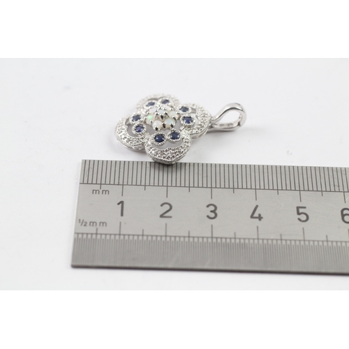 490 - 9ct white gold diamond, sapphire and opal pendant (4.3g)